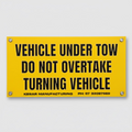 Vehicle under tow sign