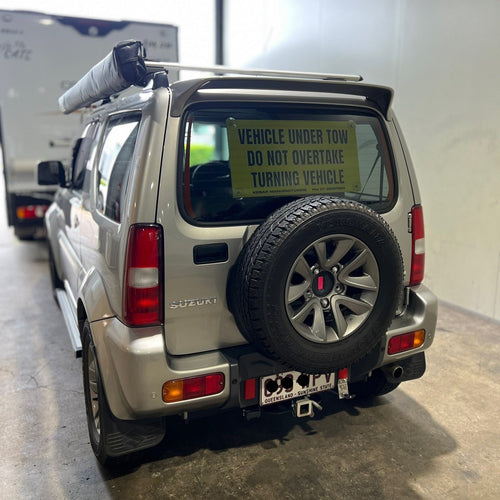 Vehicle under tow sign - Allday Industries